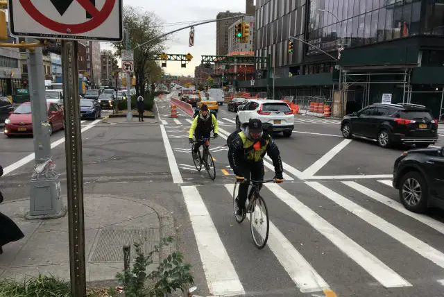 The new two-way Delancey Street protected bike lane in action last month